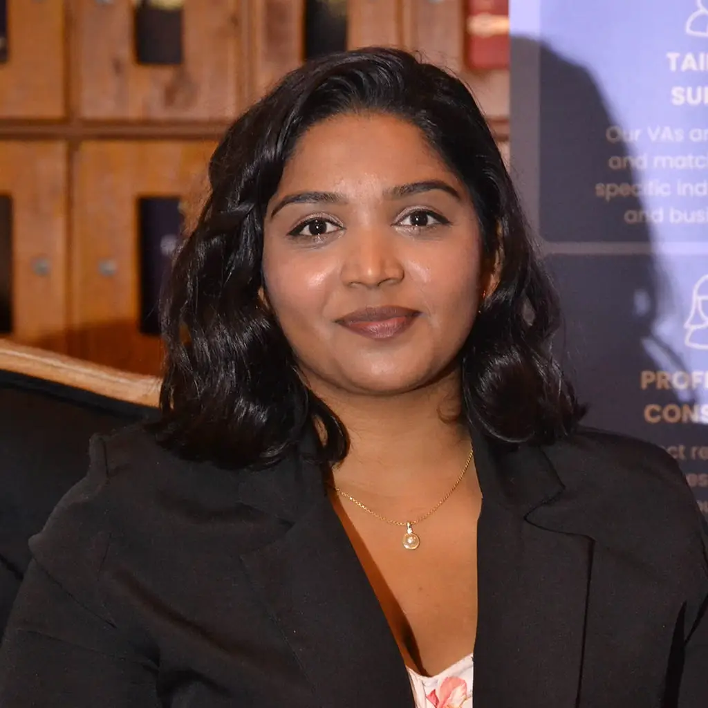 Image of a lovely young Indian lady smiling at the camera, This person is an employee at world wide VA Durban Branch.